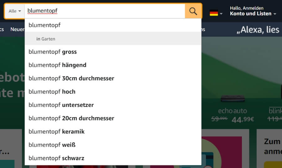Amazon search bar showing keyword suggestions.